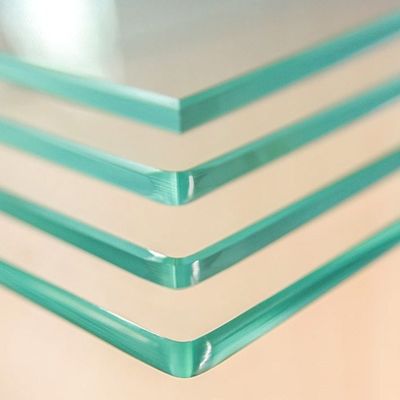 Matériau de construction en verre laminé à haute température